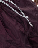 PANTALONETA RUNNING CON BOLSILLO VINO